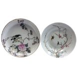 Two Chinese porcelain plates, 19th century, each decorated with birds perched on flowering branches,