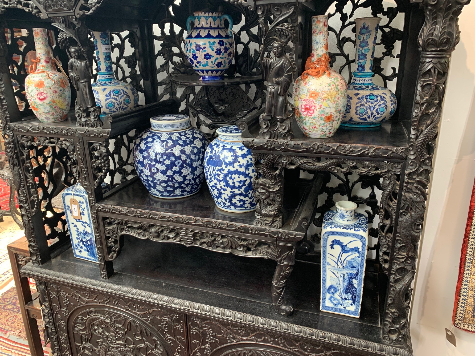 A Chinese carved ebonised display cabinet, 19th century, - Image 18 of 21