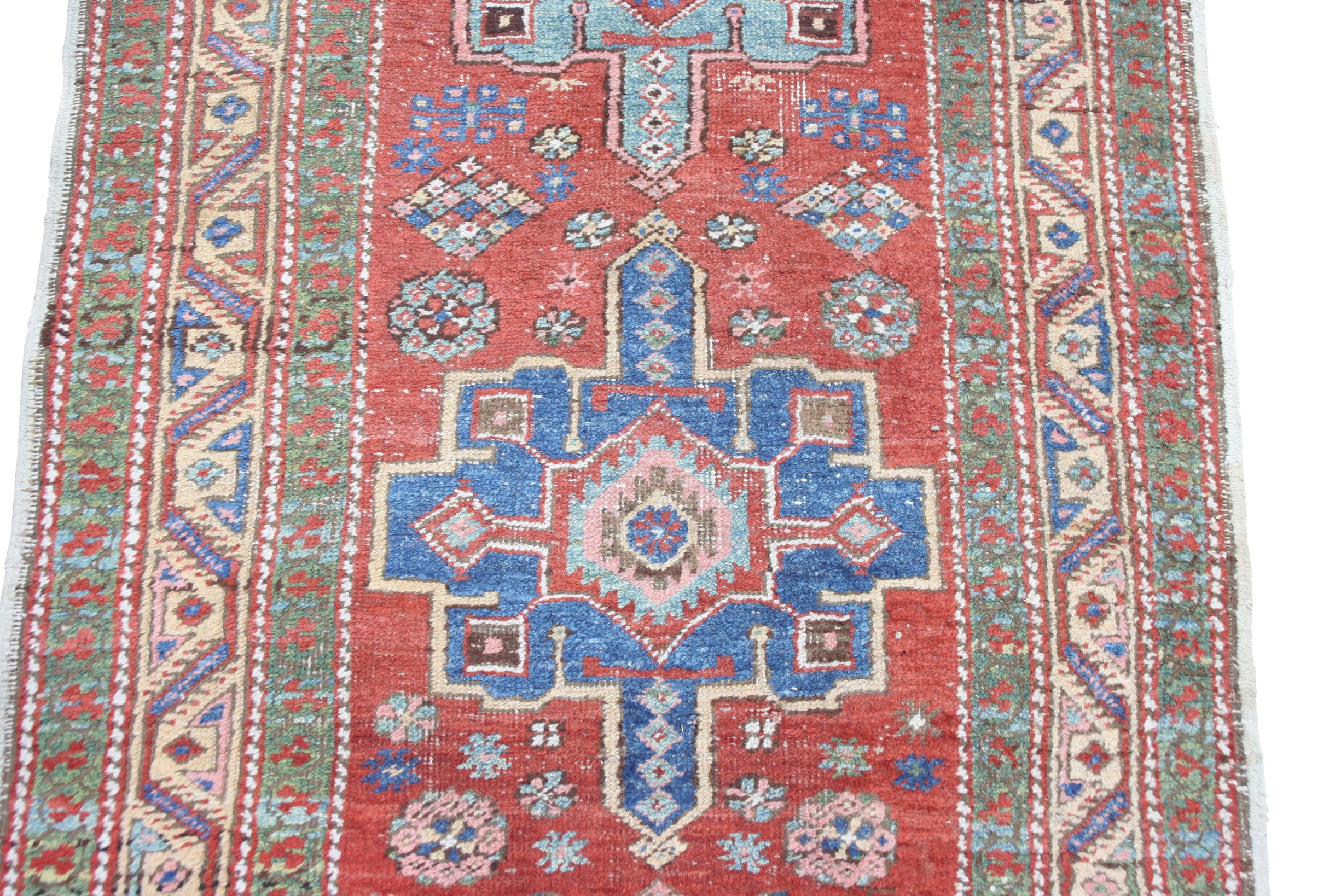 A Heriz runner, North West Persia, the madder field with seven indigo and pale blue medallions, - Image 5 of 10
