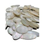 One hundred and six Chinese mother of pearl counters, of oval and circular form, lengths 5.