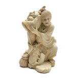 A Japanese ivory okimono of a toad catcher, Meiji period, possibly Tokyo school, signed,
