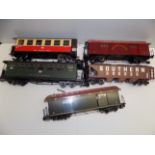 Two inch gauge railway :- three wagons and two carriage unboxed, some damage.