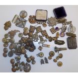 A quantity of military badges, buttons etc including Royal Hussars and R.F.C.