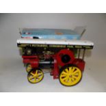 A Wilesco live steam traction engine, boxed.