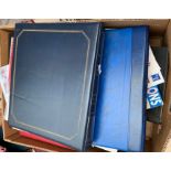 A large shoe box of British First Day covers, together with stamp albums etc.