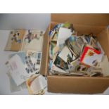 A large box of cigarette, trade and postcards etc.