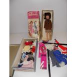 Sindy :- A doll with country casual dress, boxed and a collection of other clothing.