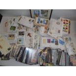 A large quantity of first day covers including better cancels, thematics on cards etc.