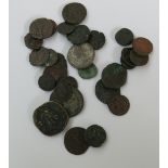 A collection of mostly later Roman bronze coins.