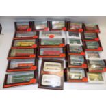 Twenty four boxed exclusive first editions Die-cast buses and coaches.