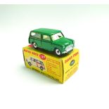 Dinky :- 197 Morris Mini-Traveller, the rare dark green with yellow interior, boxed.