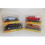 Dinky :- 163 VW fast back, 152 Rolls Royce, 153 Aston Martin and 221 Corvette, each boxed.