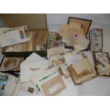 World stamps and a few cigarette cards.