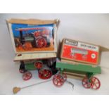 A Mamod steam traction engine and open wagon, each boxed.