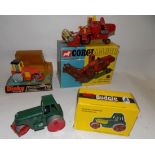 Dinky :- No. 279 Diesel Roller, No. 1111 Combine Harvester and Budgie Road Roller, each boxed.