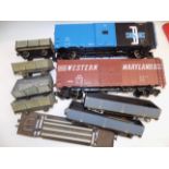 Nine 2" gauge wagons including two box cars.