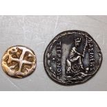 A 9 ct gold copy of an ancient coin and a copy Roman coin.