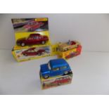 Dinky :- 176 N.S.U.R080, 114 Triumph Spitfire and Morris Mini Minor, each boxed.