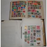 Two well filled 1950's stamp albums.