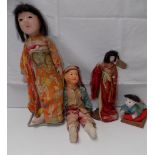 Four oriental dolls, each with composition head.
