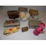 Five Japanese clockwork toys, three fur covered tin plate, one plastic, each boxed,