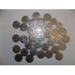 Thirty five 50p coins, most are larger size and in better condition.