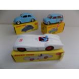 Dinky :- 181 V.W. saloon 199 Austin Seven Countryman and 237 Mercedes racing car, each boxed.