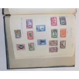 A small spring back stamp album containing used Malaysia including 1950s set to $5.