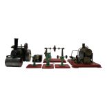 A Mamod steam roller, together with a stationary steam engine, line shaft, polishing machine,