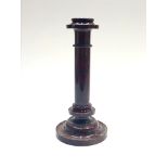 A Cornish serpentine candlestick, height 28.5cm.