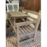 A teak garden table by Lister and a teak garden bench.