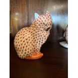 A Herend porcelain cat. (Dimensions: Height 10cm.)(Height 10cm.)