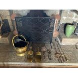 A Victorian brass coal bucket, three brass shovels and various fire side implements.