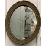 A 19th century gilt composition wall mirror.