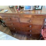 A mahogany chest of drawers, early 19th century, with two short and three long drawers, on bracket