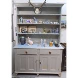 A late Victorian pine kitchen dresser. (Dimensions: Height 239cm, width 150cm)(Height 239cm, width