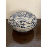 A blue and white pottery bowl and cover, decorated with fish and foliage. (Dimensions: Height