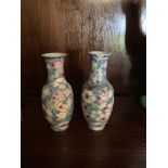 A pair of miniature Chinese millefleur porcelain baluster vases, red four character mark to base. (