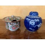 A Chinese prunus pattern ginger jar, and a Canton porcelain bowl and cover. (Dimensions: Tallest