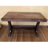An early 19th century mahogany library table, on lion paw feet. (Dimensions: height 74cm, width