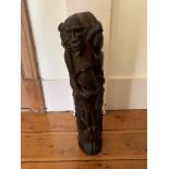 An African carved wood figural group. (Dimensions: Height 54cm)(Height 54cm)