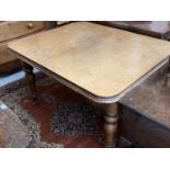 A Victorian mahogany extending dining table, with turned tapering legs. (Dimensions: Height 71cm,