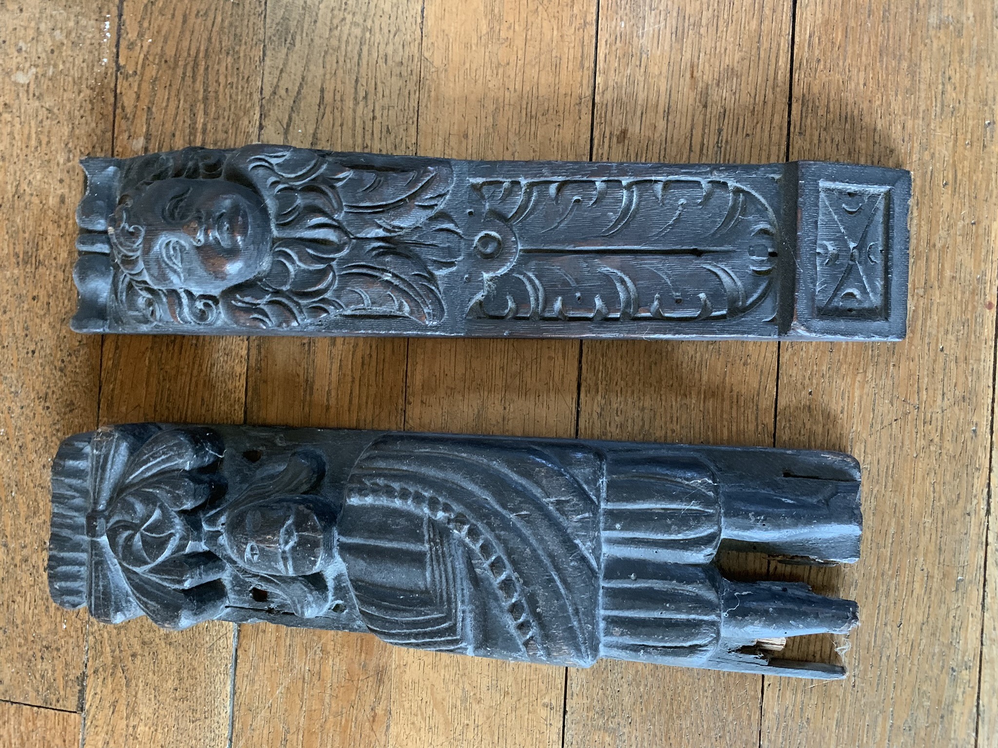 A carved oak panel depicting a male figure 10cm x 37cm, and a 19th century carving depicting a