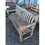 A Fire Island teak garden bench.