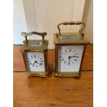 A small brass carriage clock. (Dimensions: Heights 10.5cm and 9cm)(Heights 10.5cm and 9cm)