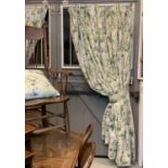 Two pairs of Colefax and Fowler type lined curtains with pelmets, and eight matching cushions. (