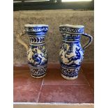 A pair of Spanish majolica jugs decorated with hunting scenes. (Dimensions: Height 18.5cm.)(Height