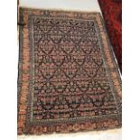 A Senneh rug, North West Persia, the indigo field with the all over herati pattern, within a