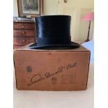 A silk top hat bearing label Harman & Son Hatters, 87 New Bond Street, with an associated box.