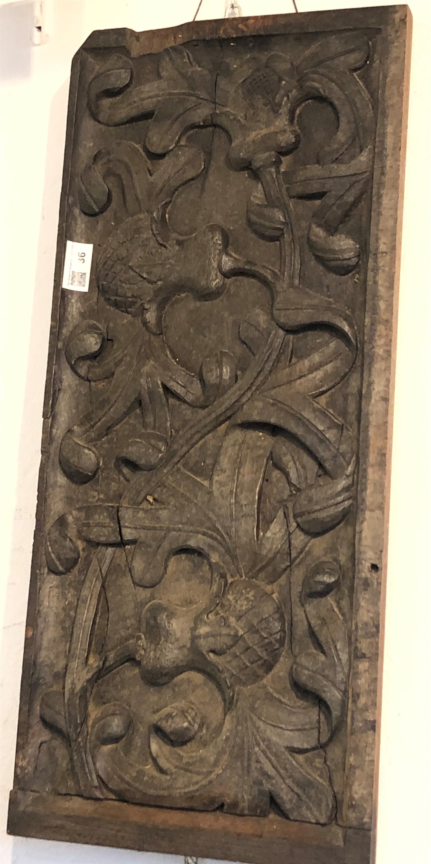 A late19th/early 20th century carved oak panel. (Dimensions: Height 27cm, width 63cm)(Height 27cm,